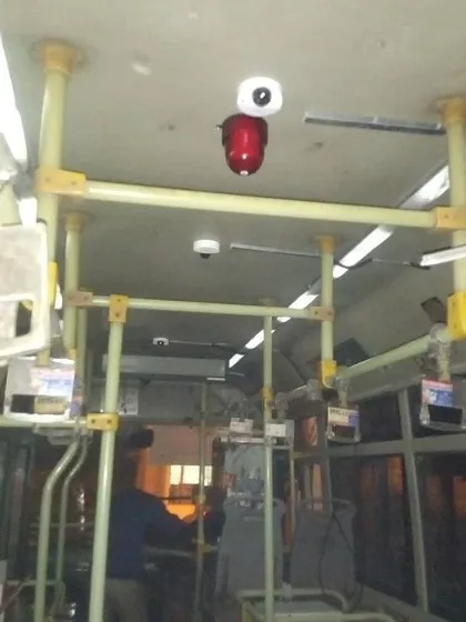 My work is not just for buildings. I also perform specialized installations, like setting up a complete multi-camera surveillance system inside this public bus for passenger safety.