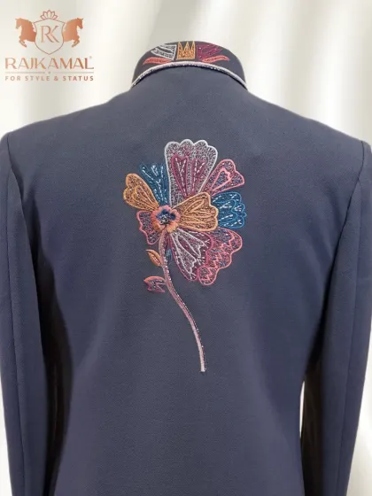 A look at the back of the floral embroidered Indo-Western piece, showing a single, colorful flower motif.