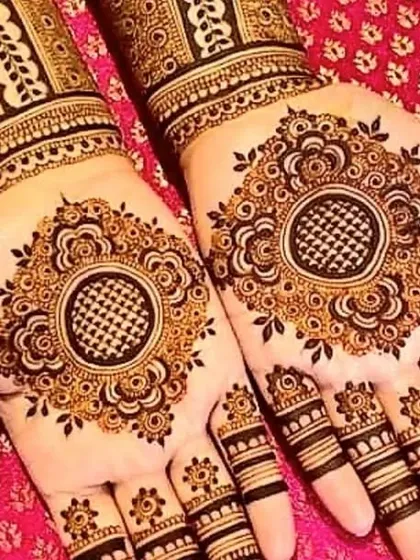 Symmetrical mandala designs that create a stunning visual when the hands are brought together. The checkerboard fill and delicate borders add a touch of modern geometry to the traditional circle.