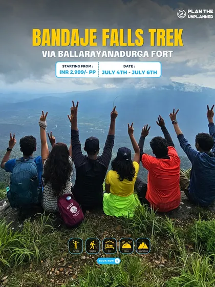 A group gives peace signs from a viewpoint on the Bandaje Falls trek.