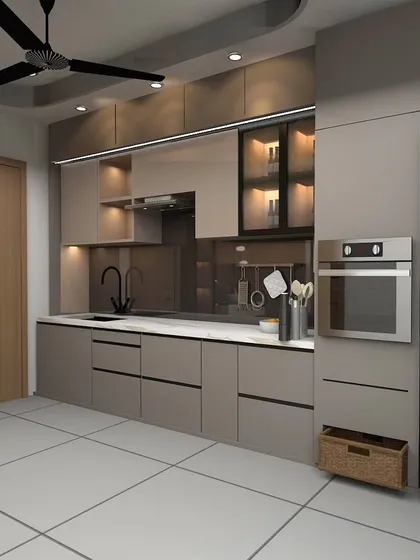 A luxurious open kitchen design featuring a matte black SMEG refrigerator, built-in oven, and tinted glass cabinets. The layout is perfect for those who love to cook and entertain.