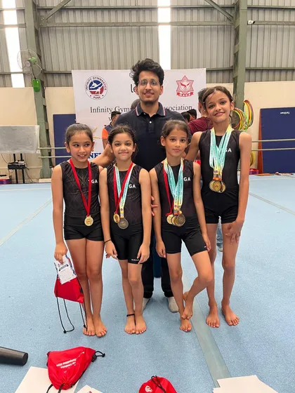 Victory! We are incredibly proud of our gymnasts showcasing their medals. This is what dedication, hard work, and expert coaching can achieve.