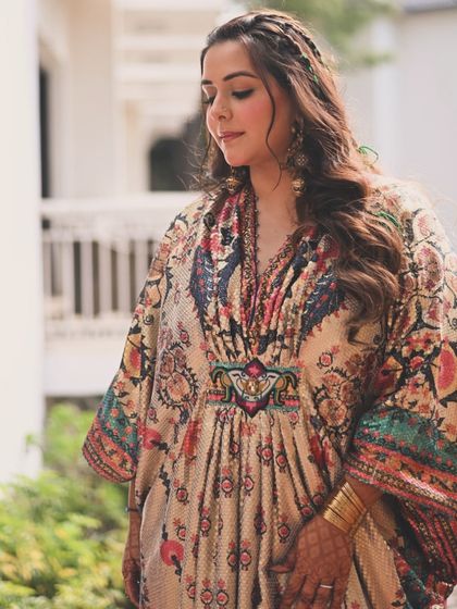 For my sister's mehendi, we chose this stunning printed kaftan from Rajdeep Ranawat. It's a timeless piece she can restyle for years to come, proving that bridal wear can be both beautiful and practical.