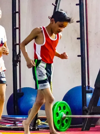 A young athlete running drills. I focus on building all-around athletic fitness in our kids' program, improving their speed, agility, and cardiovascular health.