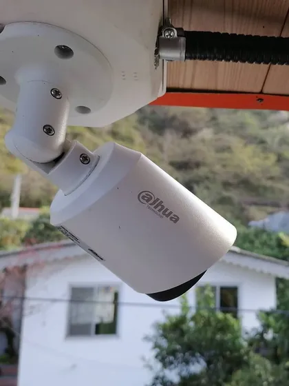 Another angle of the Dahua outdoor camera, showing its adjustable mount for precise positioning.