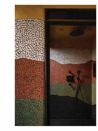 The walls of this master bathroom became the canvas. We used hand-cut china mosaic to create a flowing, Van Gogh-inspired artwork, transforming a functional space into an immersive experience of color and texture that feels like living within a painting.
