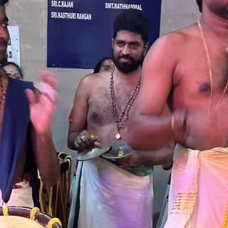 An Ilathalam artist caught in action, his focus unwavering during the intense rhythm of the Melam at Ulsoor Ayyappan Temple.
