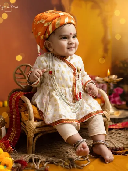 A beautiful, smiling portrait of our little 'Bal Shivaji', capturing his innocent and royal charm.