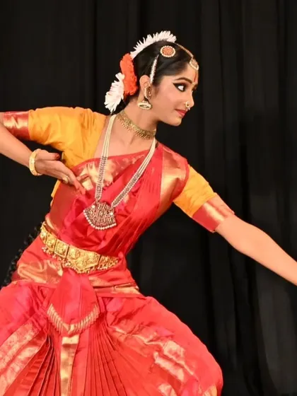 The aramandi, or half-seated posture, is foundational to Bharatanatyam. Here, my student demonstrates the perfect form and balance required, a result of countless hours of training for her arangetram.