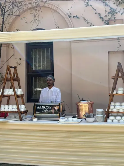 We also offer dedicated beverage stations. Here is a live coffee counter, complete with a professional machine and an attendant, ensuring your guests can enjoy a fresh brew anytime during the event.