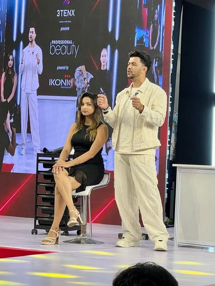 On stage at Professional Beauty India, explaining my technique to the audience. Live shows are a great platform to connect with other artists and share my passion for hair education.