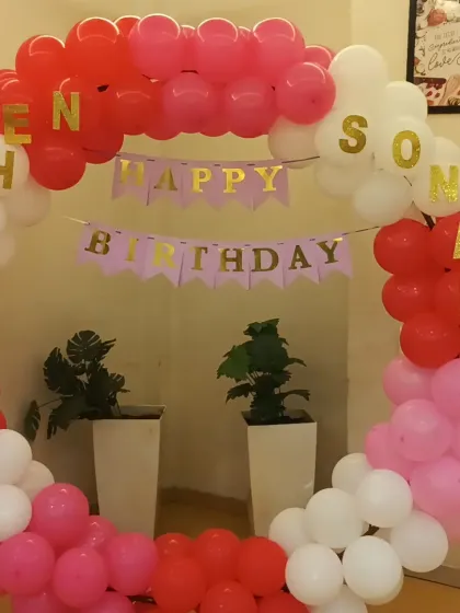A perfect photo backdrop for the birthday girls, Snehal and Sonal.