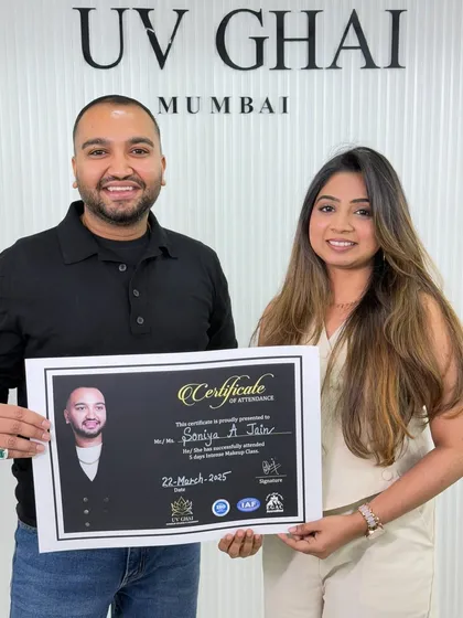 I believe in always upgrading my skills. Here I am receiving a certificate of attendance after completing an advanced makeup course with the best in the industry.