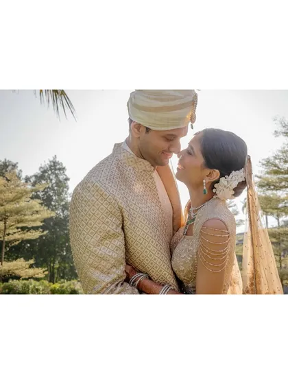 Saumya and Sid share a quiet moment in the golden light. This backlit portrait is all about their connection, their faces close as they soak in the feeling of being newlyweds.