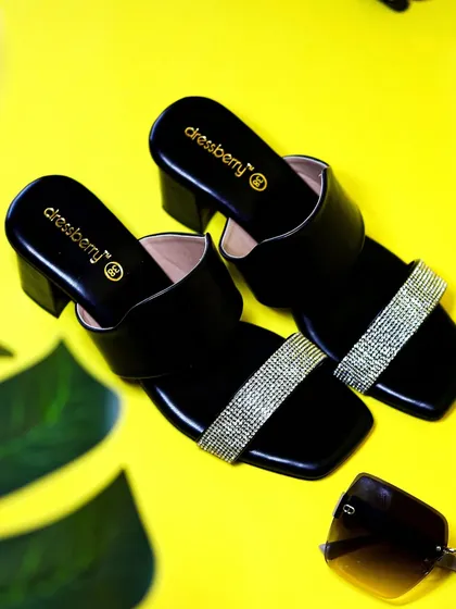 A styled flat lay of Dressberry block heels with sunglasses on a yellow background, creating a complete, ready-for-summer fashion story.