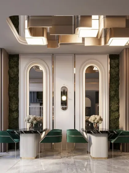 A look at the elegant symmetry in this restaurant design, featuring arched mirrors and preserved moss walls. The ribbed dining tables and velvet chairs add texture and a touch of art deco glamour.