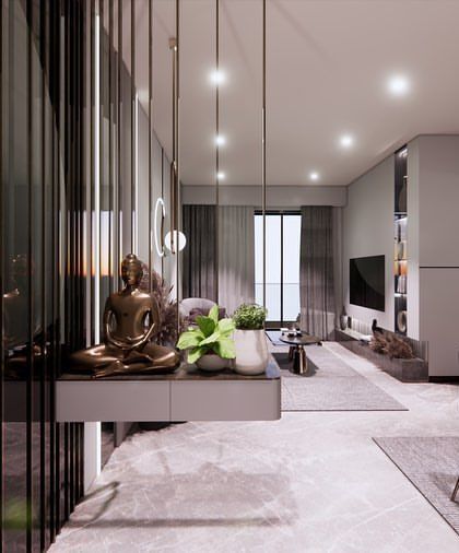 A key tip for budget-friendly luxury is to invest in good styling. Here, a simple layout is elevated by carefully chosen upholstery, soft furnishings, and a serene Buddha statue.