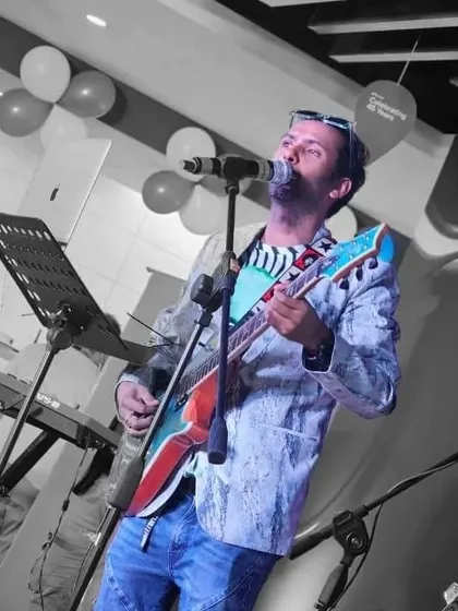 Our lead singer, giving a soulful performance at the Micron Technology celebration.
