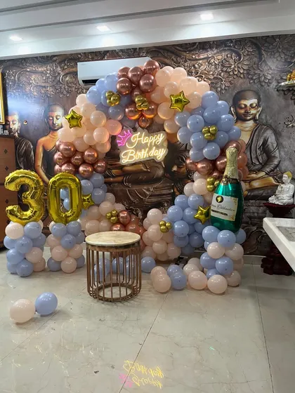 This angle shows the depth and dimension of the balloon arch decoration.