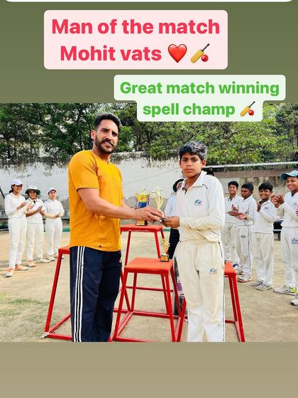 Mohit Vats receiving his Man of the Match award for a great match-winning spell.