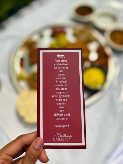 A personalized menu card for a Maharashtrian feast, written in Marathi script. This thoughtful detail shows my dedication to creating a truly customized and culturally rich experience for my clients.