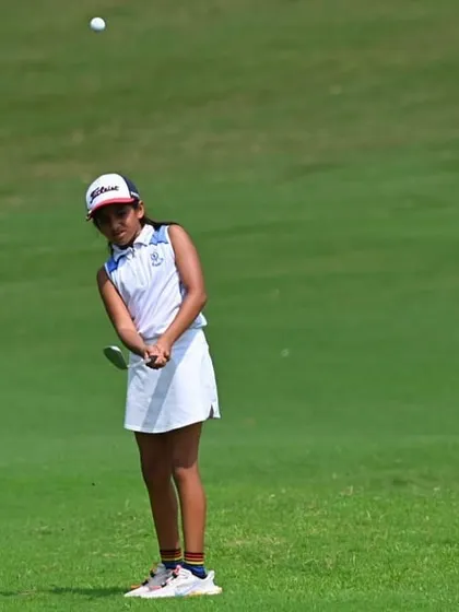 Suhani Chandra focuses on her chip shot during the US Kids Golf Tournament.