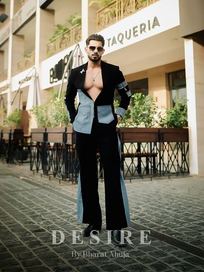 A full-length, powerful stance in the black and denim fusion co-ord set. This look perfectly blends street edge with high-fashion tailoring.