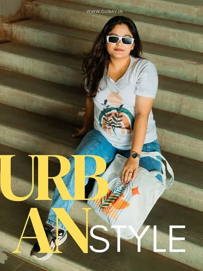 An 'Urban Style' magazine concept for a casual wear brand. The shot is framed to feel like a real page layout, showcasing the t-shirt and tote bag in a relaxed, cool setting.