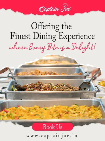 We offer the finest dining experience where every bite is a delight. This image captures a guest's view of a long buffet line filled with a variety of delicious dishes in chafing trays.