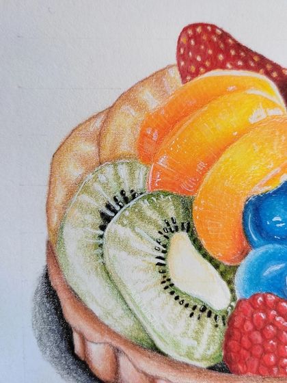 A detail shot focusing on the sliced kiwi and orange segments in the fruit tart illustration.