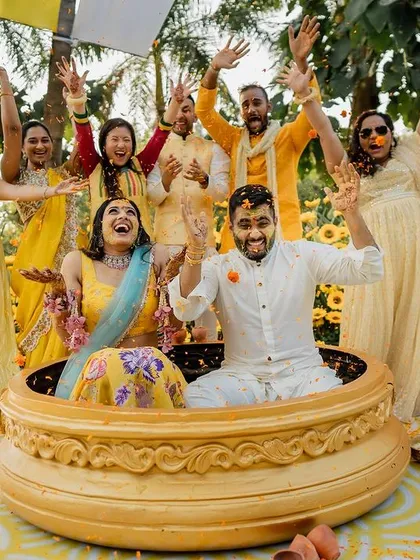 A Haldi ceremony should be full of joy and laughter. We created this incredibly fun setup with a giant 'urli' for the couple, surrounded by a field of sunflowers, ensuring the photos and memories would be as vibrant as the day itself.