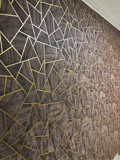 Another angle of the textured wall, demonstrating how the pattern catches the light differently across its surface, creating a dynamic and interesting feature wall.