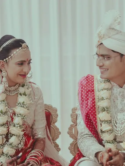 The bride and groom sharing a sweet glance during their wedding ceremony.