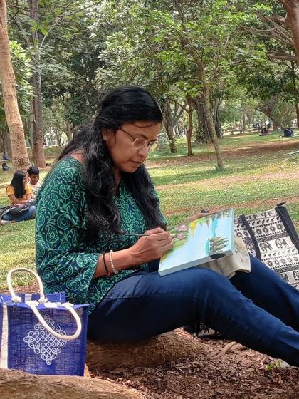 Another angle of me painting in my happy place, under the trees.