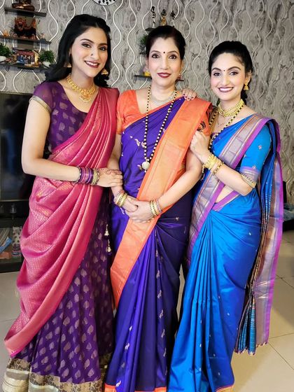 Another beautiful family portrait. It shows my ability to handle bulk draping for families, ensuring everyone looks coordinated and beautiful for an event.