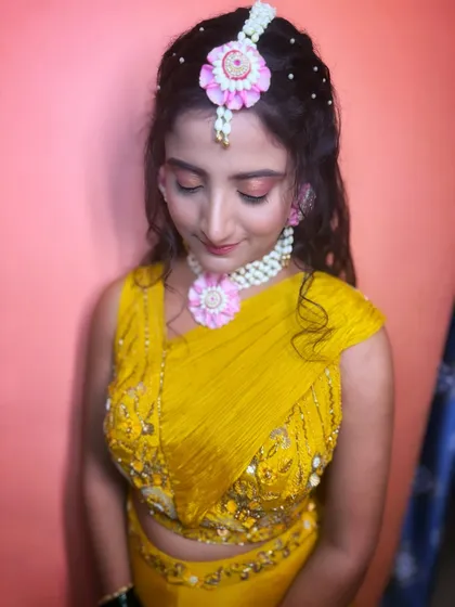 A beautiful portrait of my Haldi bride. The floral jewelry and soft makeup make her look like a princess.