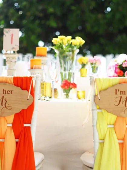 A repeat of the charming "Mr & Mrs" chair signs, emphasizing the personal details we incorporate into wedding celebrations to make them significant and memorable.
