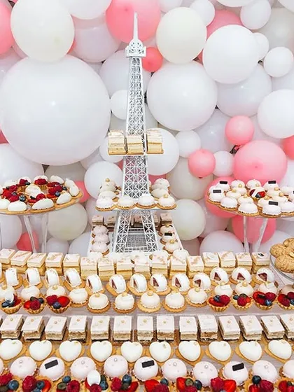 While we specialize in corporate events, our expertise extends to all celebrations. This image of a beautiful baby shower dessert table shows our versatility in catering for any important occasion.