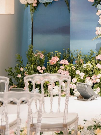 Another detail of the pastel decor, with the transparent chairs adding to the light and airy feel of the setup. The focus is on the beautiful flowers and the soft color palette.