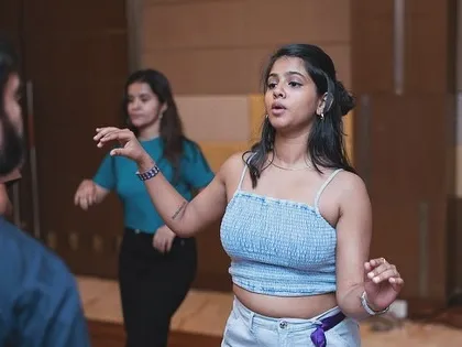 Me, Prisha, breaking down the hand styling and movement for the followers during a workshop.