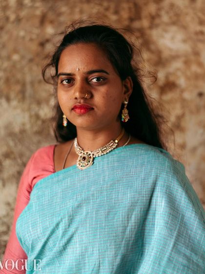 A powerful portrait of a woman artisan from Dhar, Madhya Pradesh, published on PhotoVogue. The image captures her direct gaze and self-styled traditional attire.
