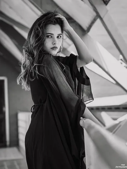 A black and white version of a fashion portrait. Stripping away the color helps to focus on the emotion, form, and texture, resulting in a timeless and classic image.