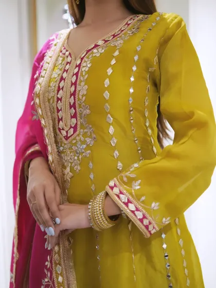 Colors and an outfit that speak louder than words. This yellow and pink suit set is vibrant and beautiful.