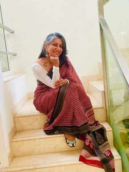 The combination of the printed saree and embroidered juttis makes for a comfortable yet stylish look for any day.