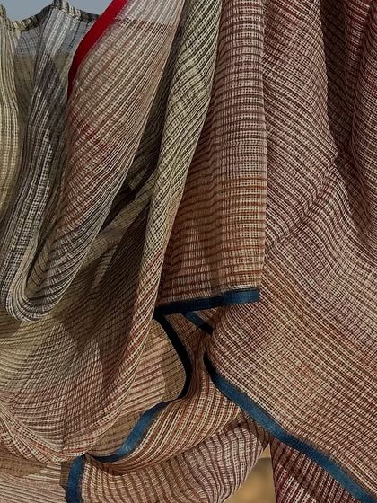 A close-up of the multi-color block-printed Paheli Kota dupatta. The intricate layers of color create a beautiful, versatile accessory.