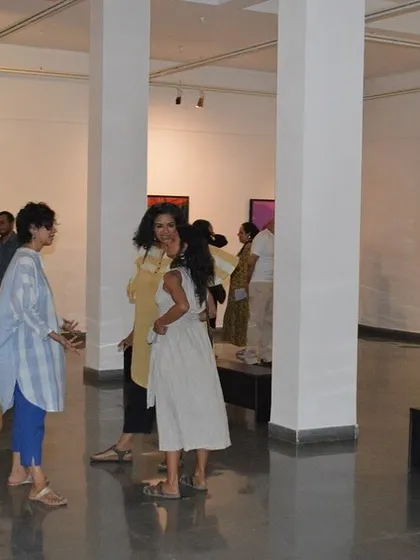Guests mingling at the preview of 'Toy Boy From Malabar'.