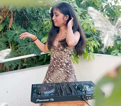 An artistic edit with butterfly effects, adding a touch of magic and fantasy to my outdoor DJ setup.