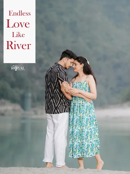 A romantic portrait of a couple embracing by the calm river, with the text 'Endless Love Like River' enhancing the theme.