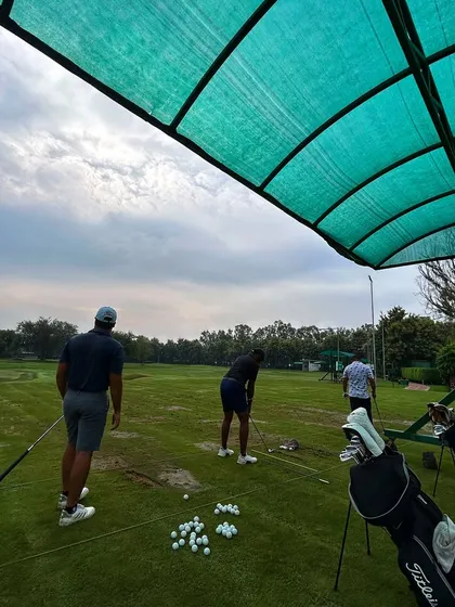 A group of friends enjoying a Saturday session under the covered bays, with plenty of balls ready for action.