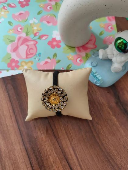 My collection of decorative elastic hair bands. Each one features a unique handmade centerpiece, including gotapatti, Kundan work, zardozi, and bead embroidery.